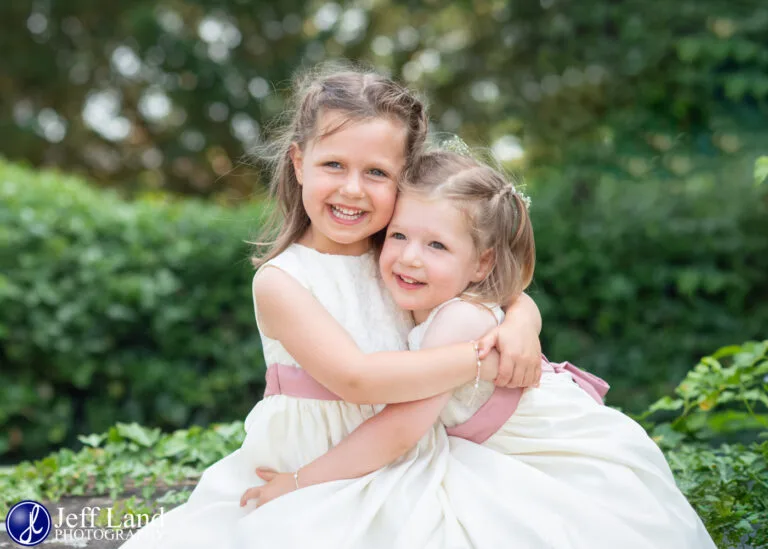 Flowergirls Cuddling Wedding at St Michael’s Church Claverdon