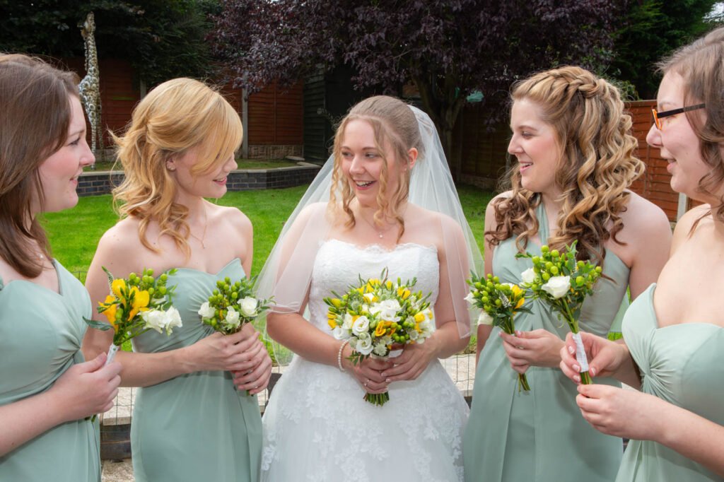 Wedding Photographer at Brownsover Hall Hotel in Rugby candid photo with bridesmaids