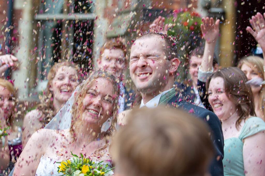 Wedding Photographer at Brownsover Hall Hotel in Rugby confetti time