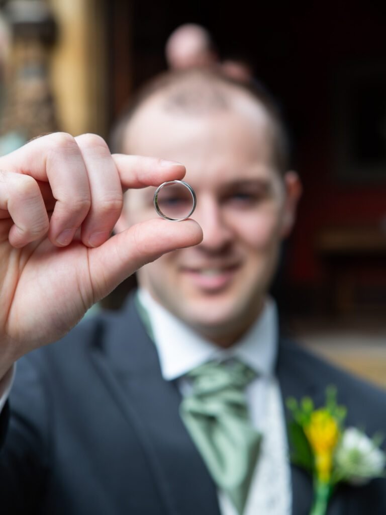 Wedding Photographer at Brownsover Hall Hotel in Rugby groom and ring