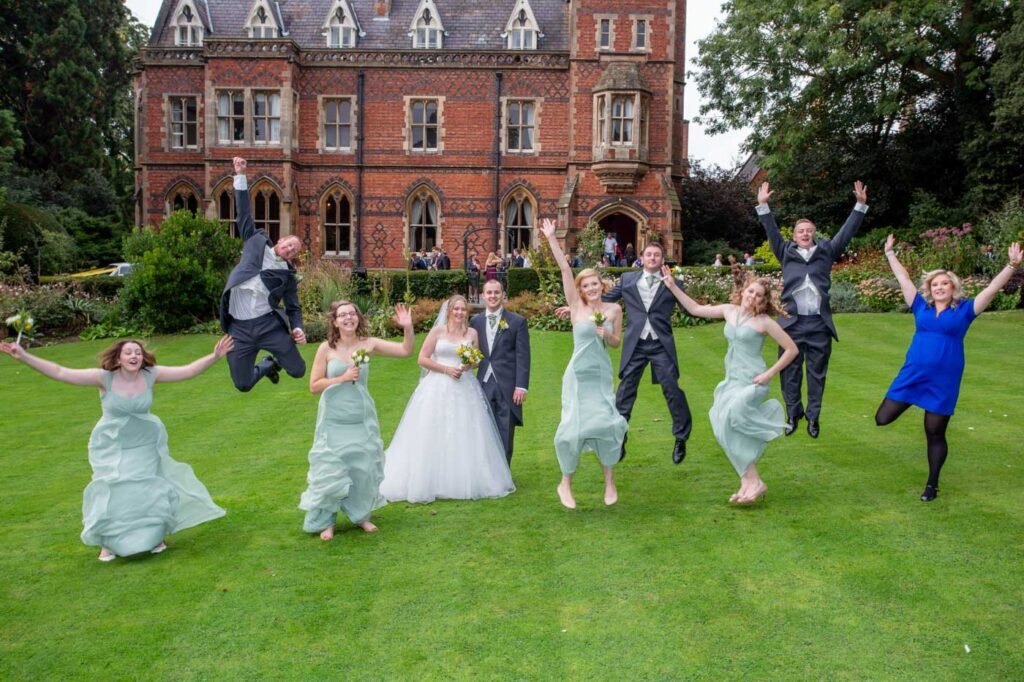 Wedding Photographer at Brownsover Hall Hotel in Rugby jump shot