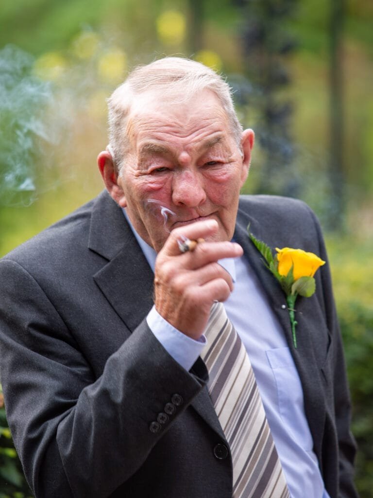 Wedding Photographer at Brownsover Hall Hotel in Rugby old boy smoking