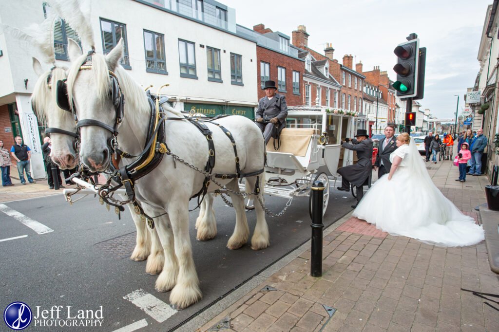 Bride and Dad in Horse Drawn White Wedding Carriage at The Warwick Arms