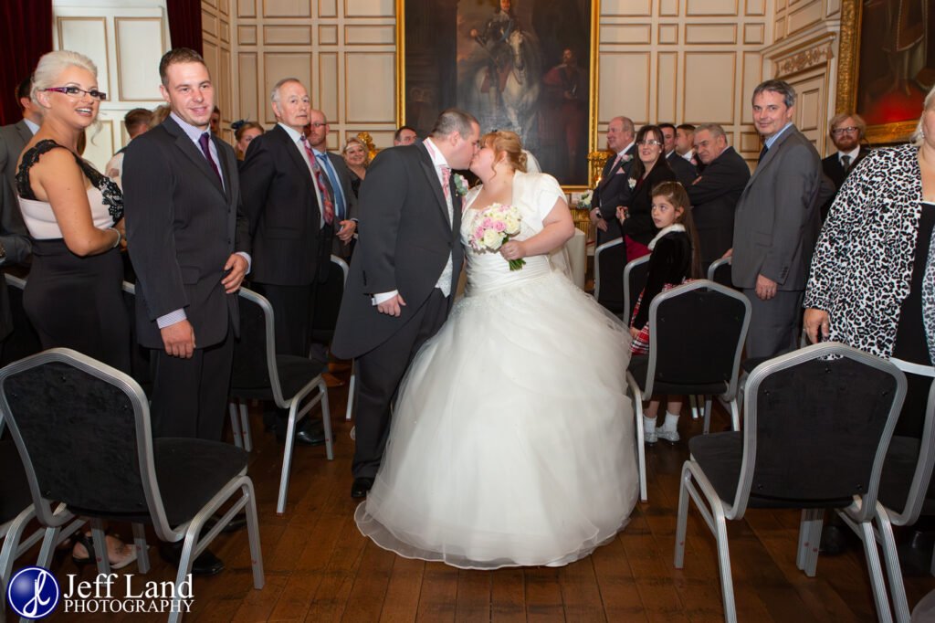 Bride and Groom First Kiss at a Wedding in Warwick Castle