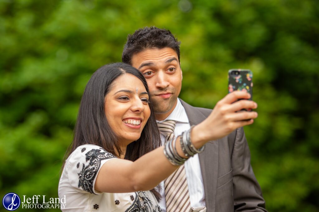 Guests having fun taking selfie at a Chesford Grange Wedding