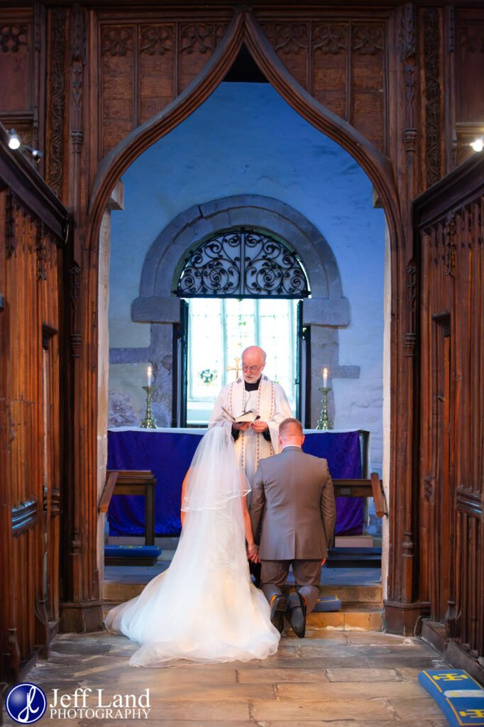 Tradition wedding ceremony blessing at St Peters Church Wootton Wawen