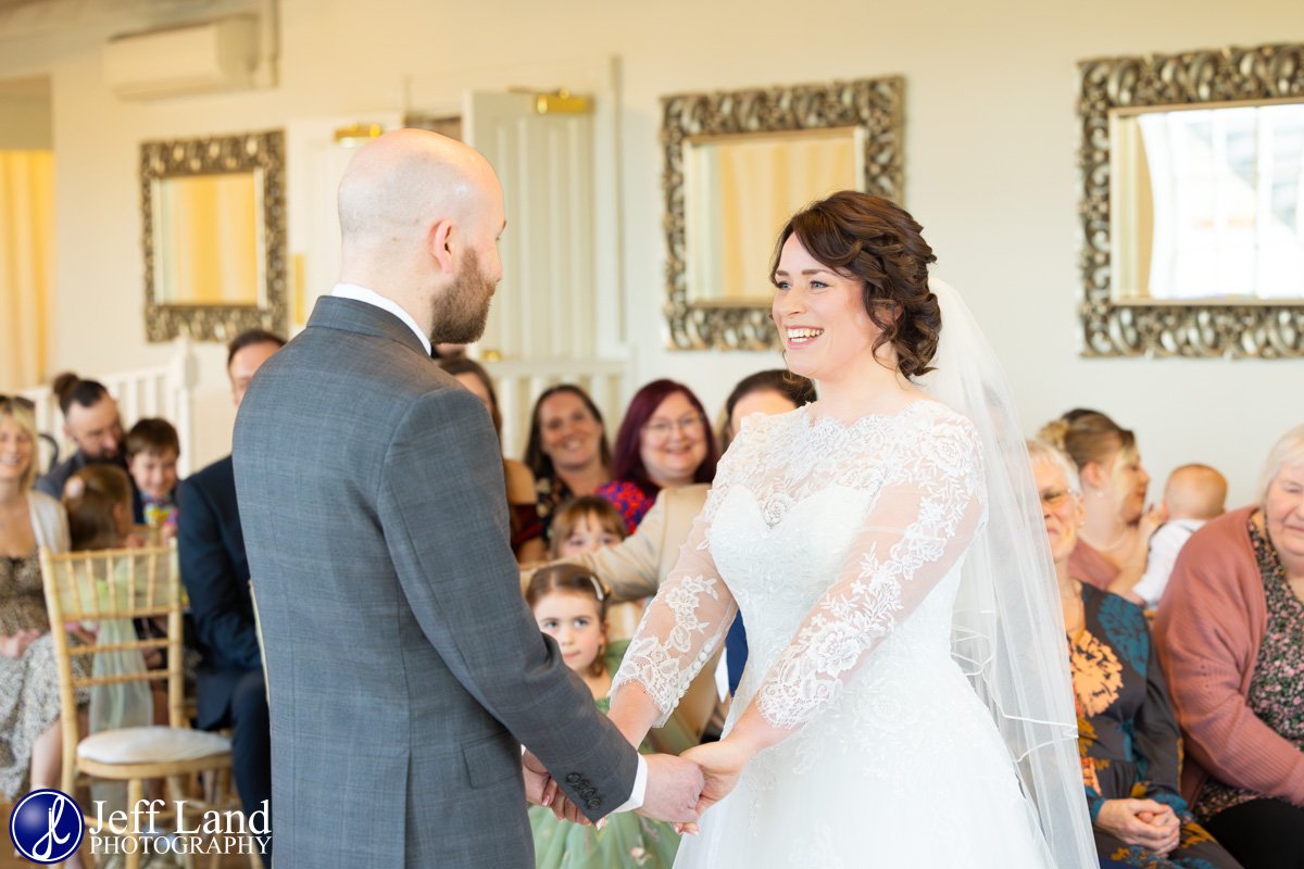 Bride looking at Groom during Wedding Ceremony at Warwick House
