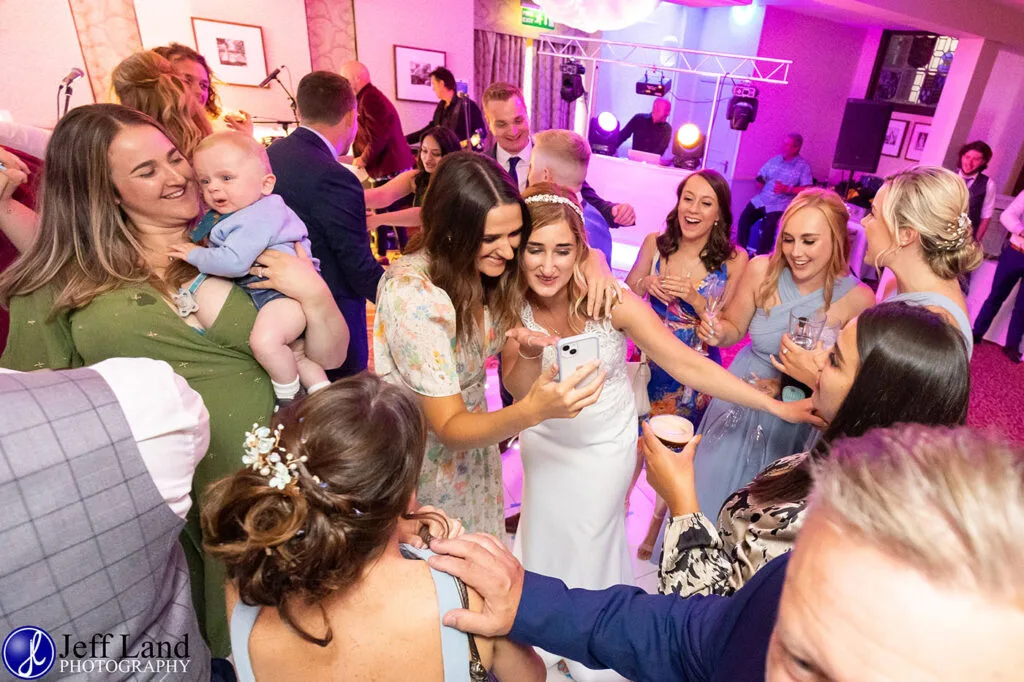 Approved Wedding Photographer at the Macdonald Alveston Manor Hotel. Based in Stratford-upon-Avon covering Warwickshire and the Cotswolds Bride on Dance Floor