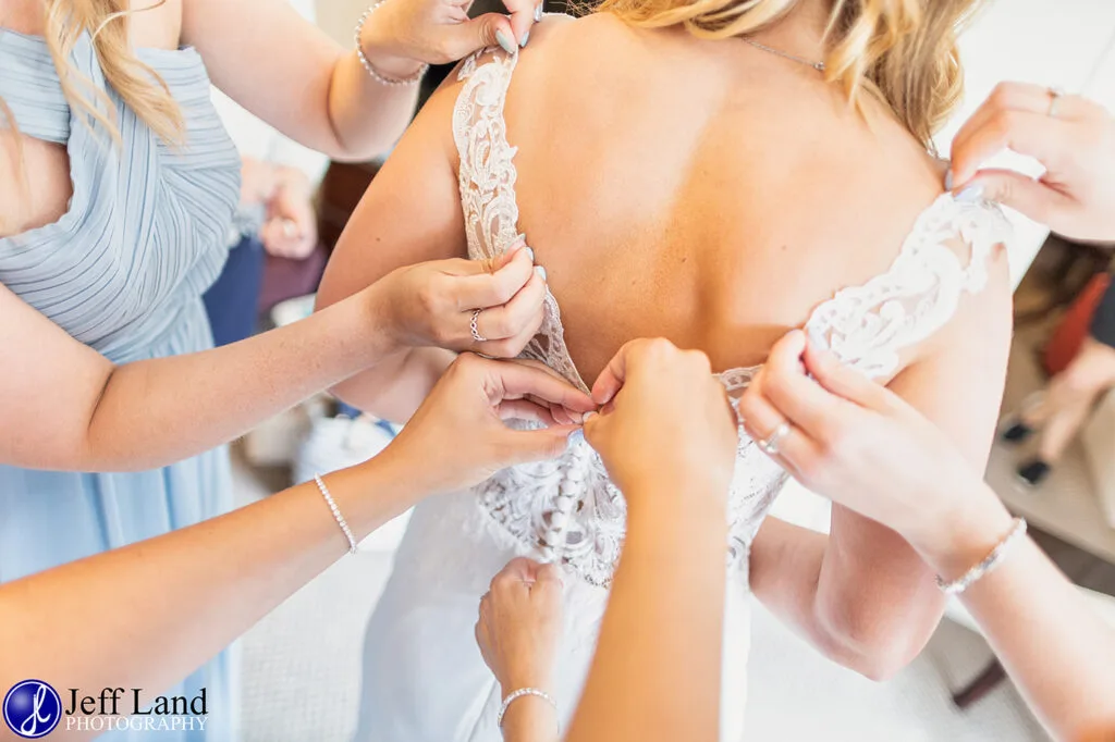 Approved Wedding Photographer at the Macdonald Alveston Manor Hotel. Based in Stratford-upon-Avon covering Warwickshire and the Cotswolds Dress Buttons