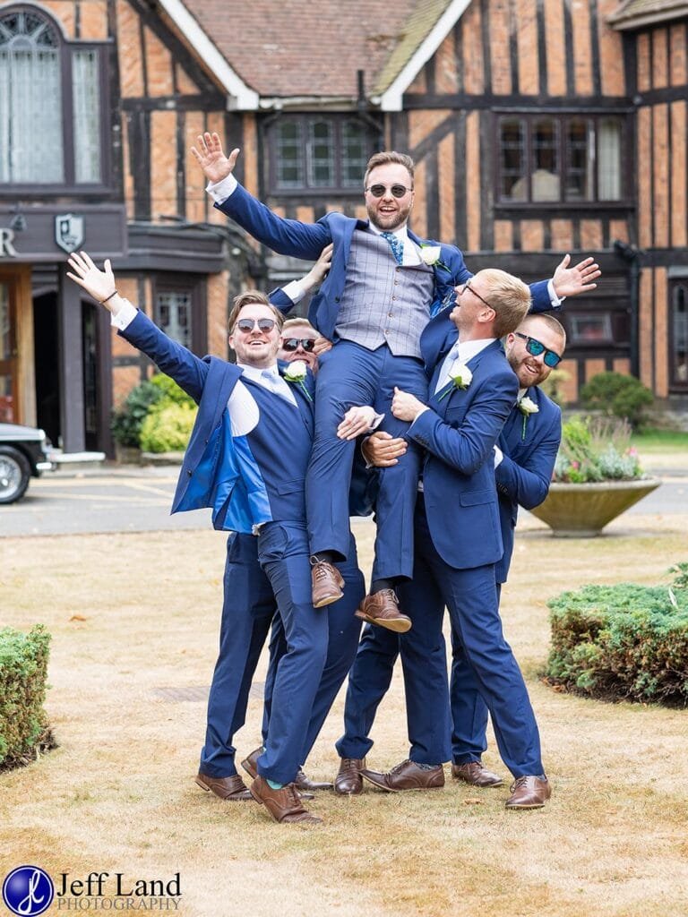 Approved Wedding Photographer at the Macdonald Alveston Manor Hotel. Based in Stratford-upon-Avon covering Warwickshire and the Cotswolds Groom Having Fun