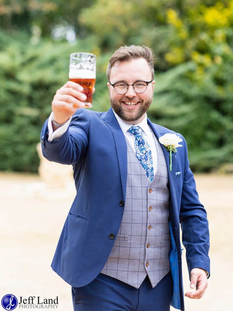 Approved Wedding Photographer Macdonald Alveston Manor Stratford-upon-Avon, Warwickshire The Groom Cheers