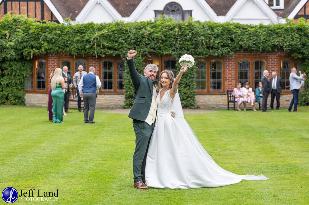 Bride and Groom fist pump approved Wedding Photographer Alveston Manor Stratford upon Avon