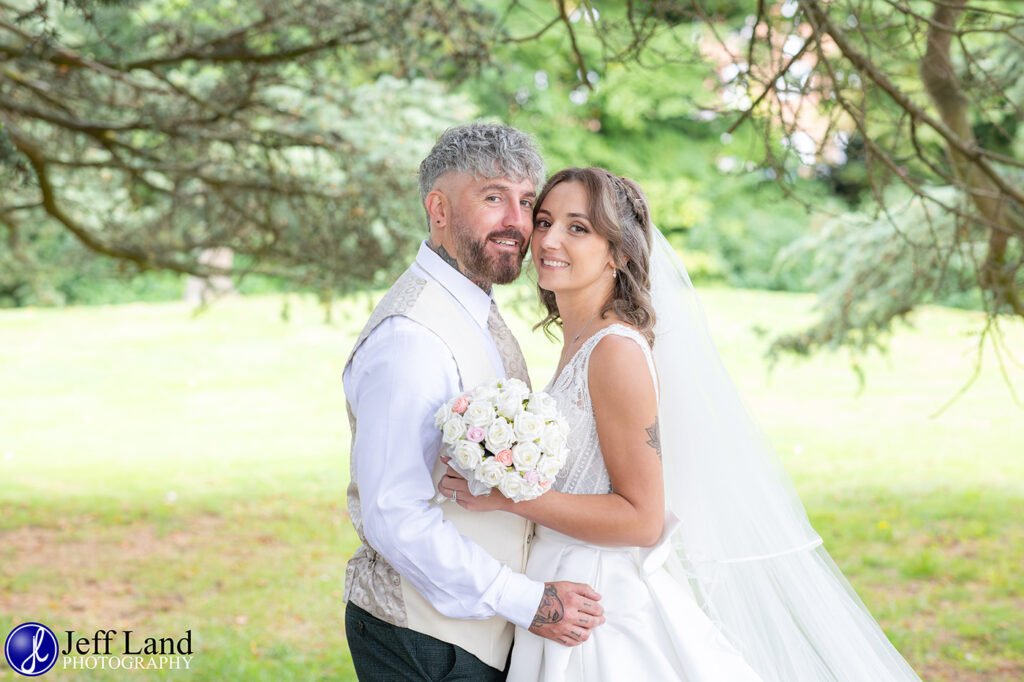 Bride and Groom portrait under cedar tree approved Wedding Photographer Alveston Manor Stratford upon Avon