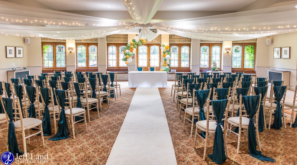 Cedar Room dressed for wedding ceremony approved Wedding Photographer Alveston Manor Stratford upon Avon