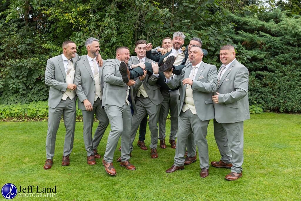 Groom and Groomsmen having fun photo approved Wedding Photographer Alveston Manor Stratford upon Avon