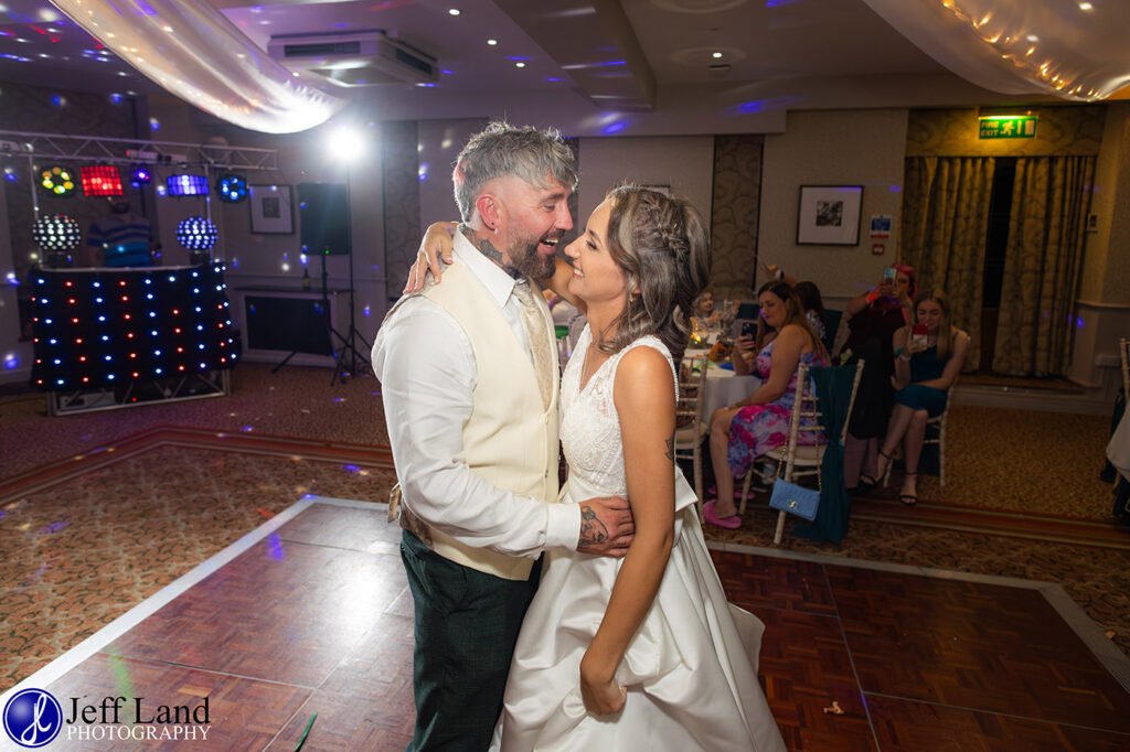 Happy Bride and Groom first dance approved Wedding Photographer Alveston Manor Stratford upon Avon