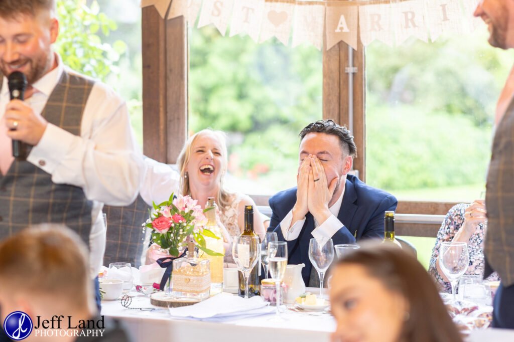 Wedding Reception at Alveston Pastures Farm Stratford upon Avon, Warwickshire best man speech groom cupped hands