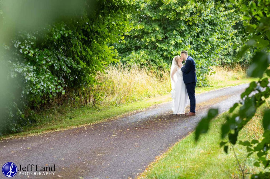 Wedding Reception at Alveston Pastures Farm Stratford upon Avon, Warwickshire secret kiss