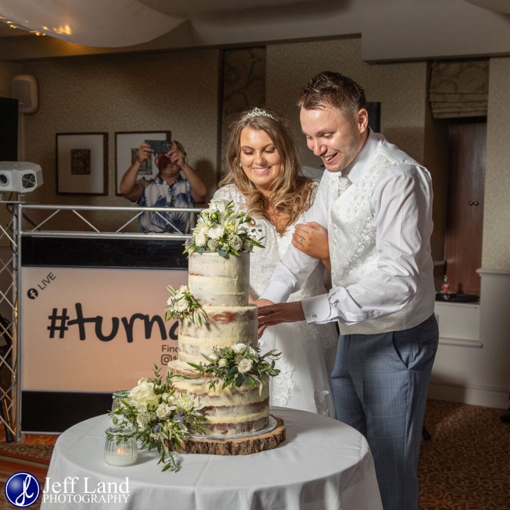 Bride & Groom Cut the Cake Alveston Manor