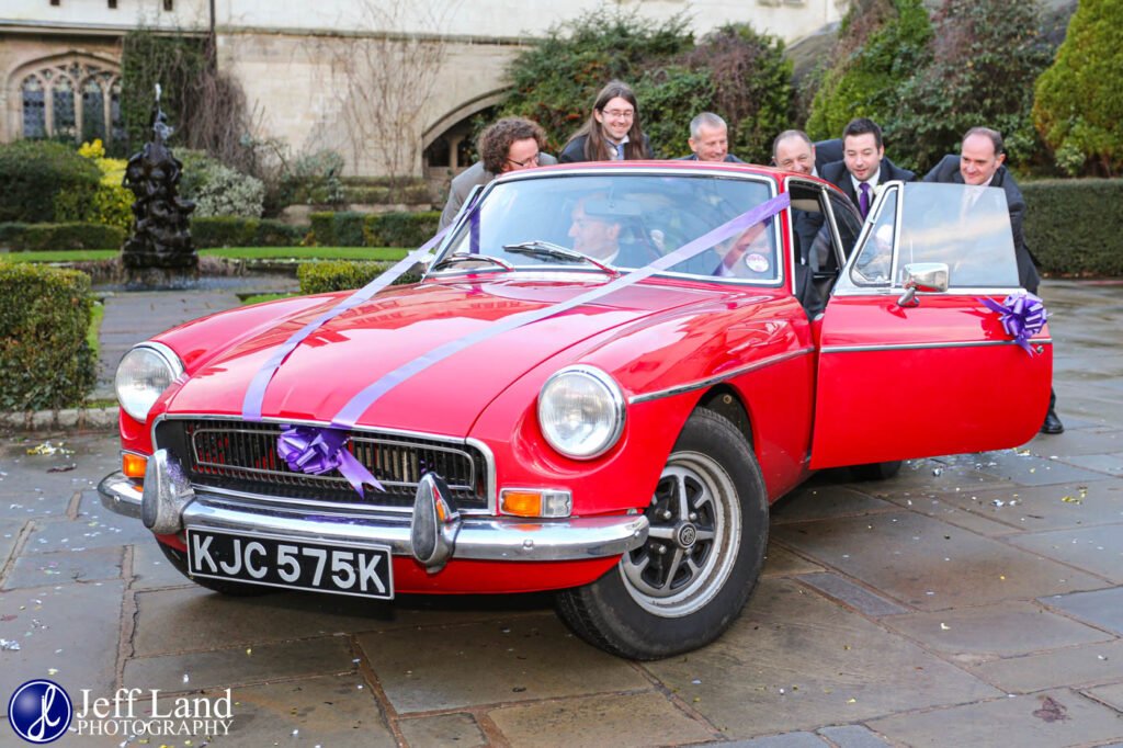 Coombe Abbey Hotel Wedding fun shot with old MG sports car