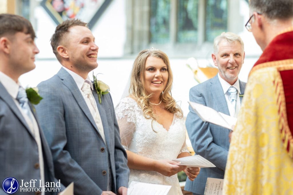 Fun During the Wedding Vows Holy Trinity Church Stratford upon Avon