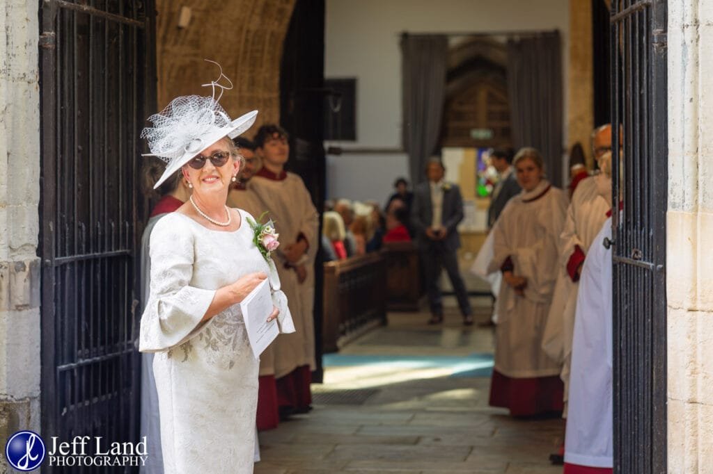 Mother of the bride waiting at Holy Trinity Church Wedding Stratford upon Avon