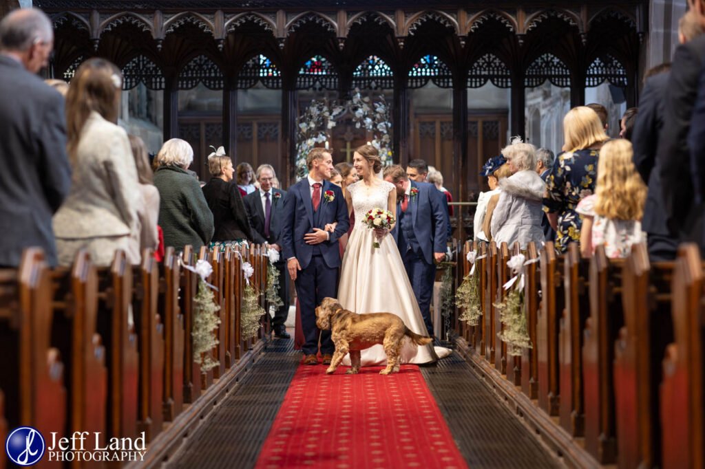 Bride and Groom walk down the aisle at Knowle Parish Church