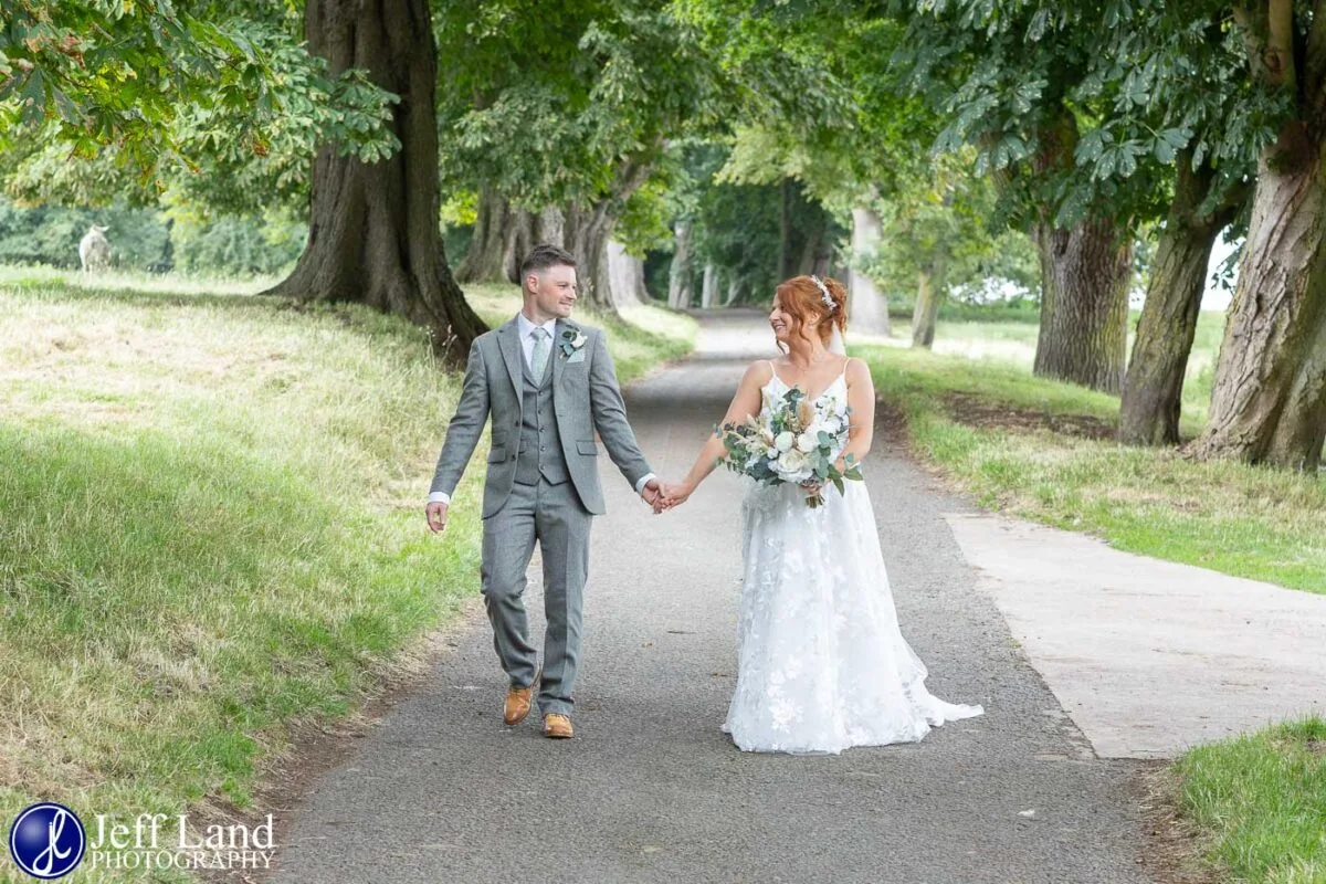 Mickleton Hills Farm Wedding Photography bride and groom walking
