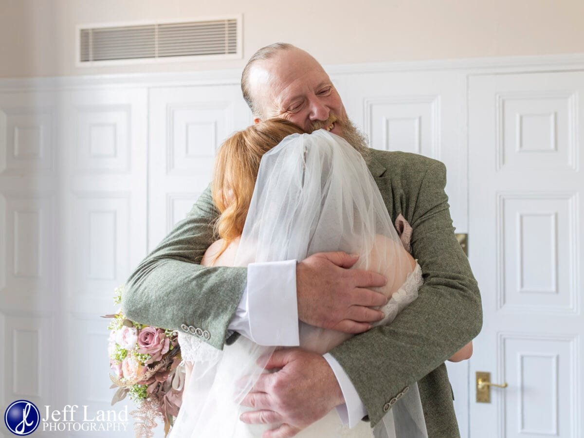 Dad first look hug photo at Alveston Manor Stratford-upon-Avon, Warwickshire