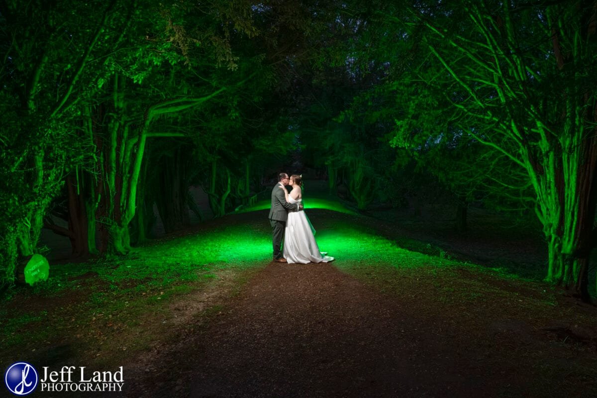 Low-Light Wedding Photography with green lights at Ettington Park Hotel Stratford-upon-Avon