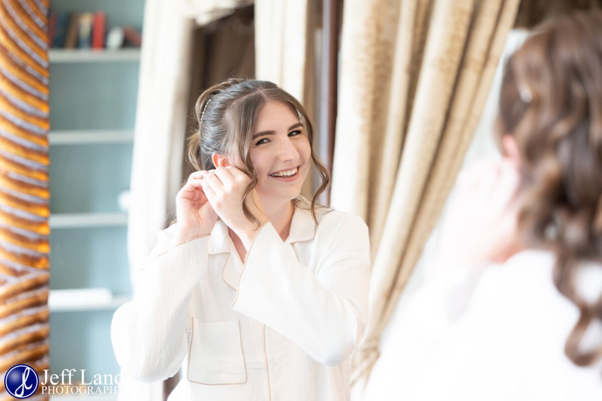 Happy Bride to be looking into the mirror at The Welcombe Hotel